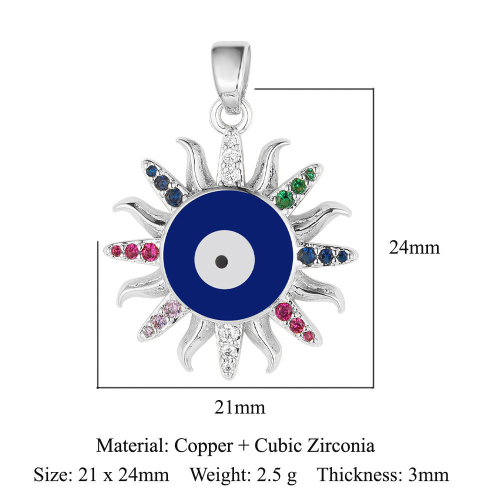 Colgante de cobre y circonita con forma de media luna y ojos 