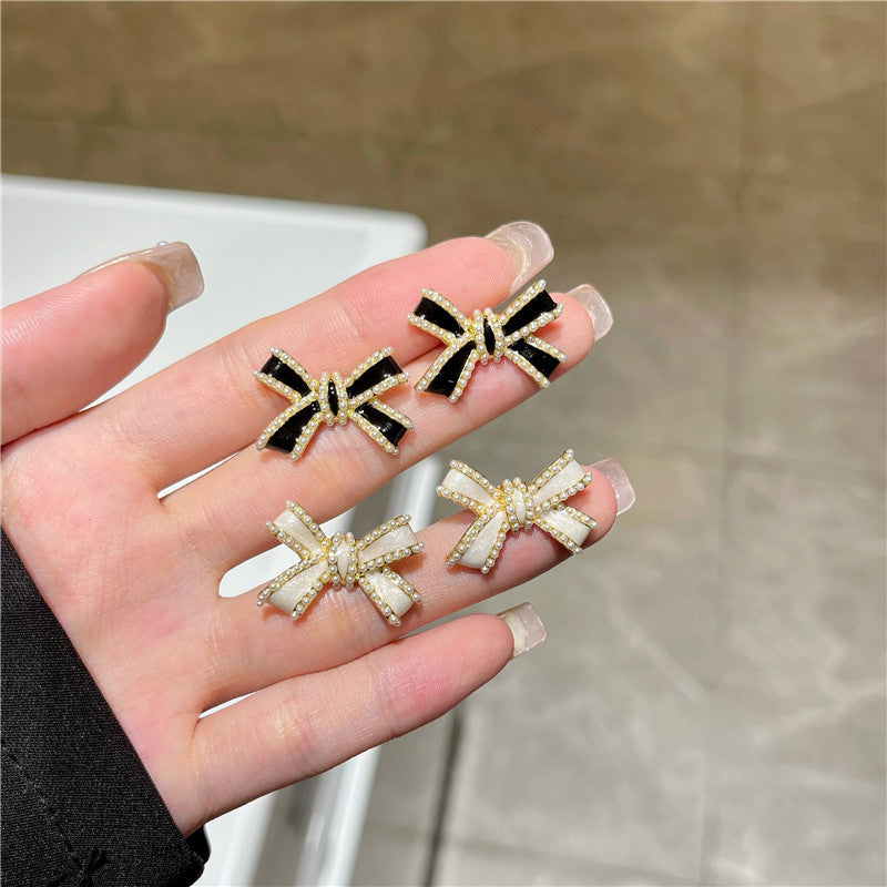 Pendientes con flecos de perlas y lazo de aguja de plata S925