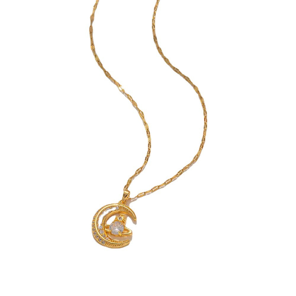 Conjunto de collar y anillo Saturno con luna y circonitas dobles de Vivienne 