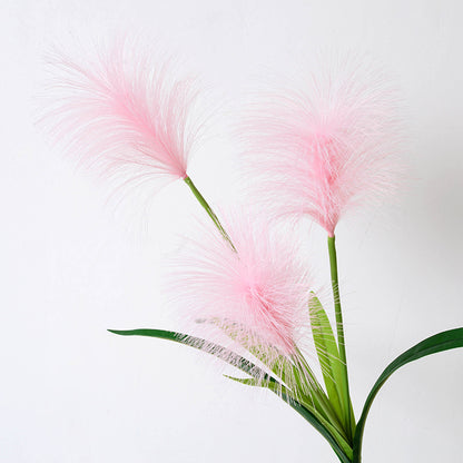 Simulación de 3 flores de pasto de caña. 