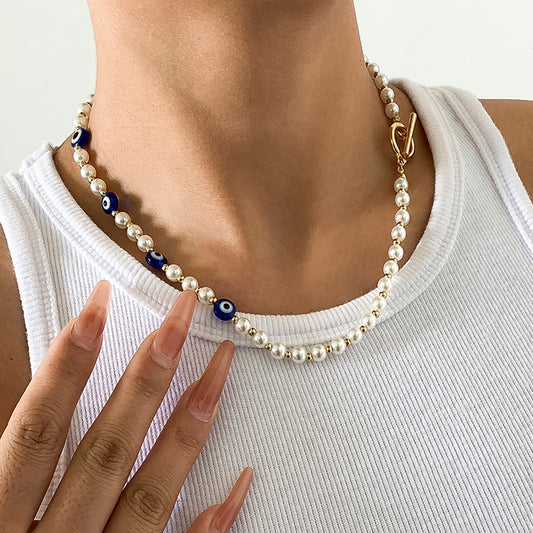 Collar de ojo de perla de imitación empalmado 