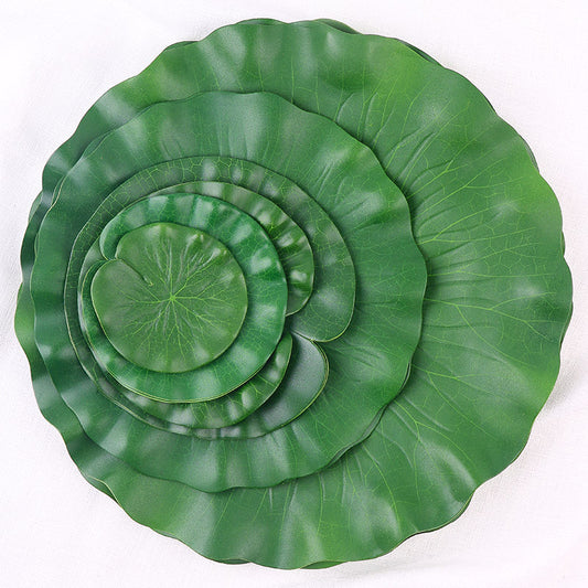 Simulación de hoja de loto de plástico verde. 