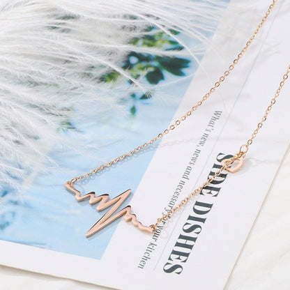 Electrograph wave rose gold necklace
