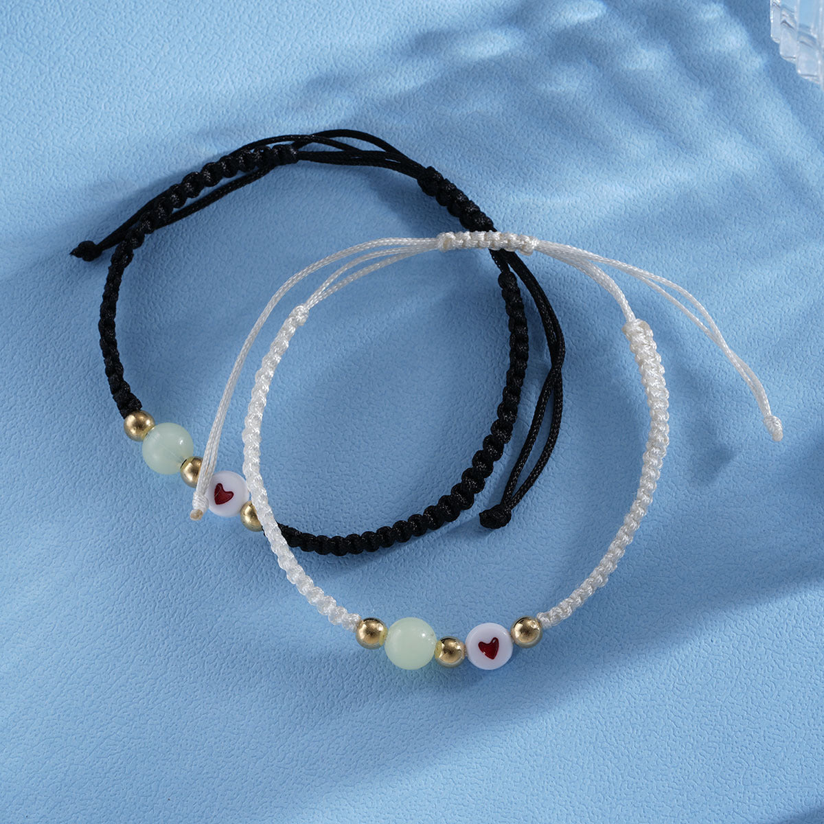Luminous Peach Heart Woven Couple Bracelets (2-Piece)