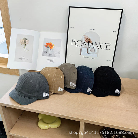 Gorra de béisbol suave de ala corta 