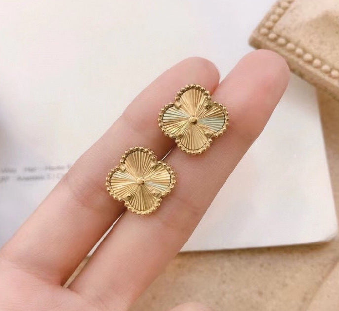 Embossed four-leaf clover titanium steel necklace