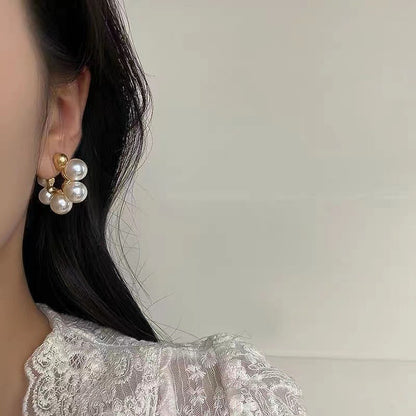 Vintage C-shaped large pearl stud earrings