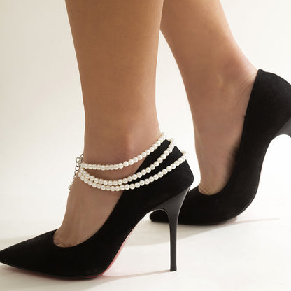 Tobillera estilo étnico con borlas y lentejuelas 