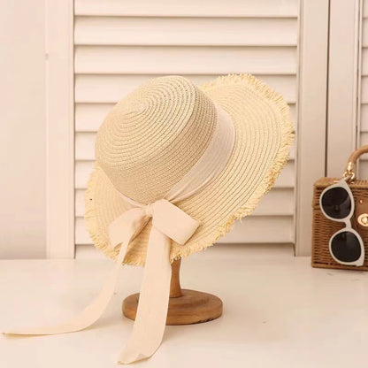 Sombrero de paja con lazo de tendencia para mujer, sombrero de ala plana tejido para vacaciones de verano 