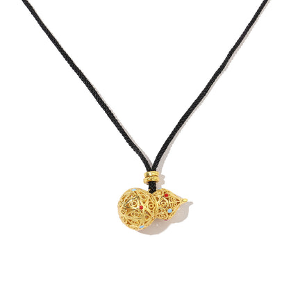 Collar de oro y arena con forma de calabaza y dios de la riqueza bañado en oro real de 24 quilates 