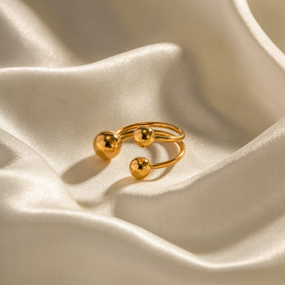 Anillo abierto tres bolas oro 