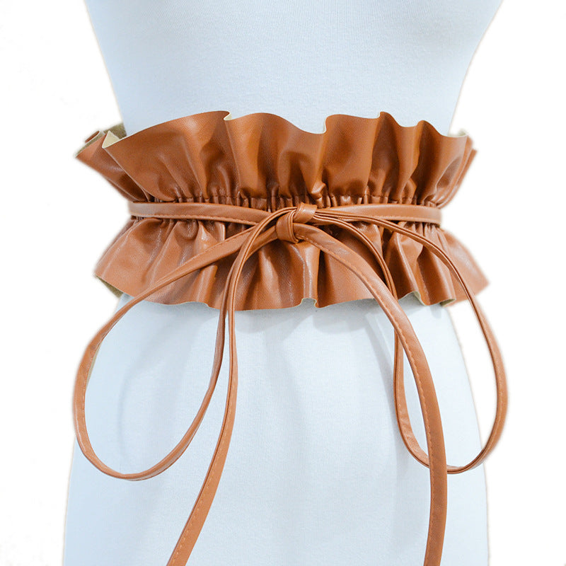 Elastic pleated edge belt
