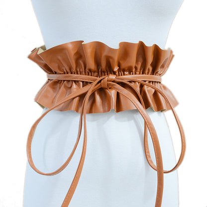 Elastic pleated edge belt