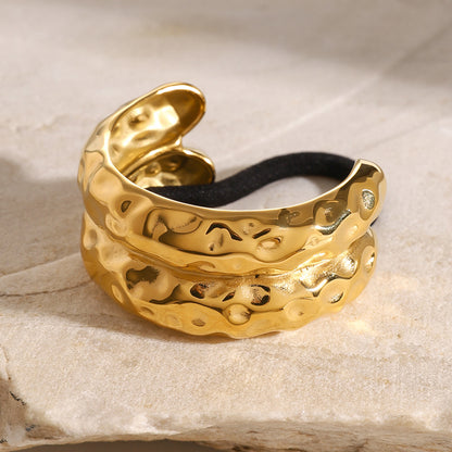 Diadema de acero de titanio dorada 