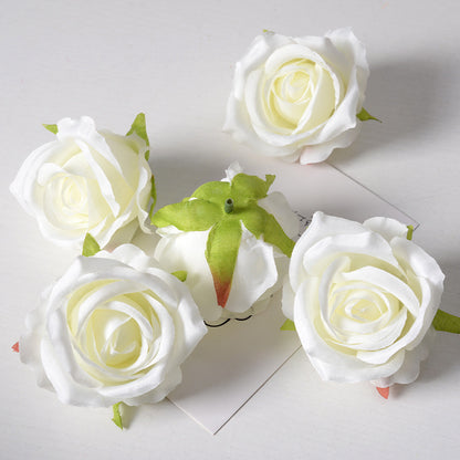 Artificial rose flower head