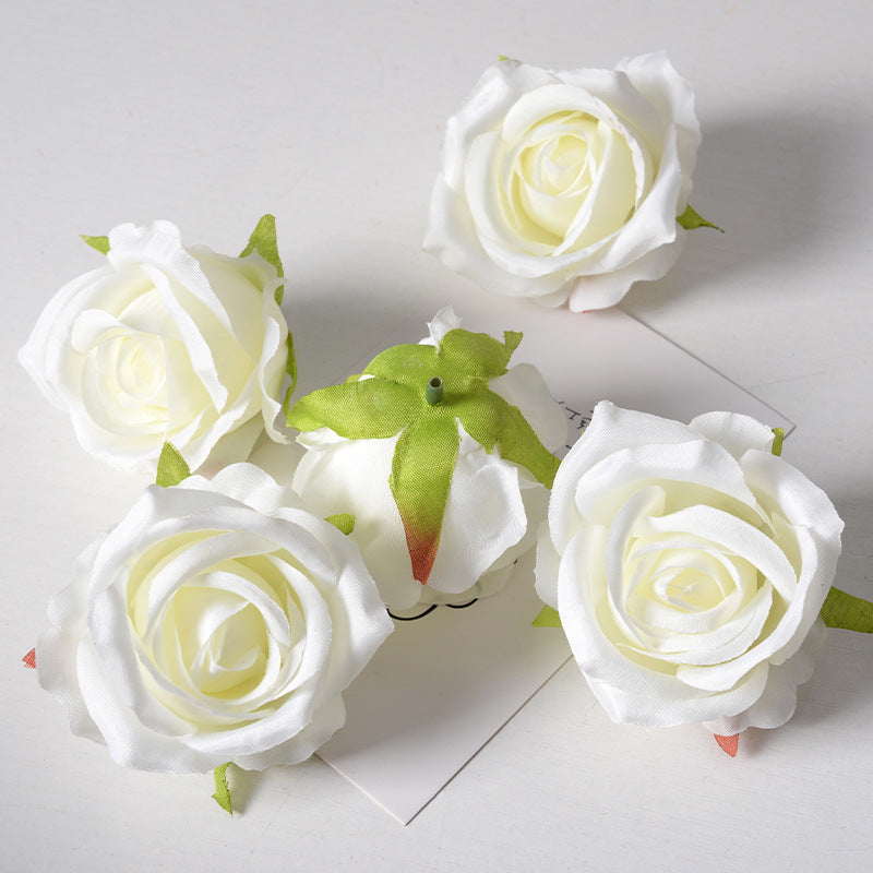 Artificial rose flower head