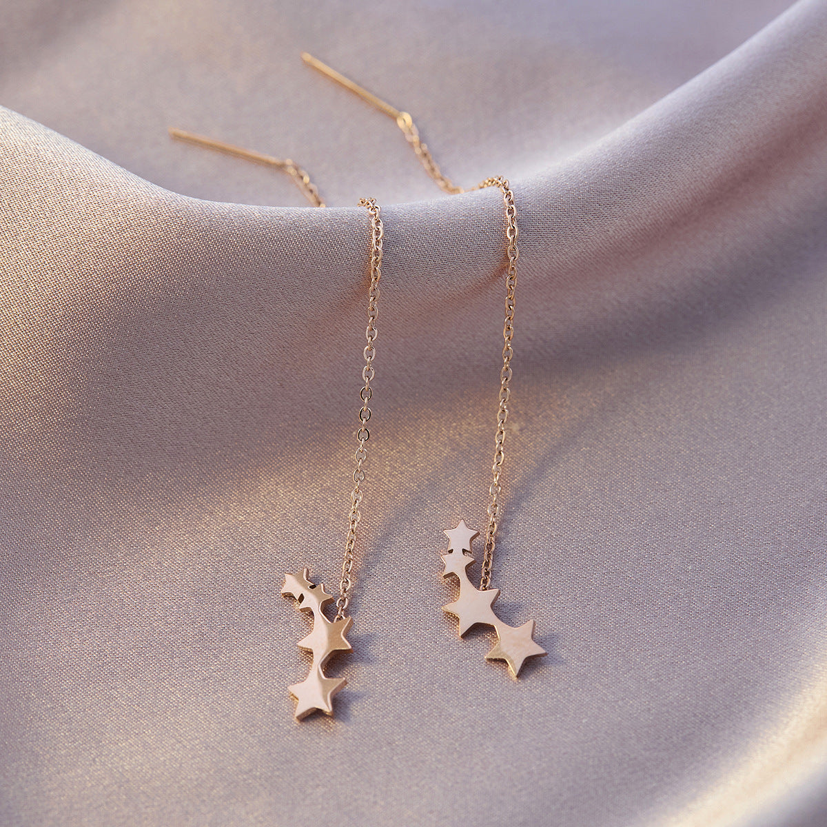 Four-leaf clover titanium steel ear buckle