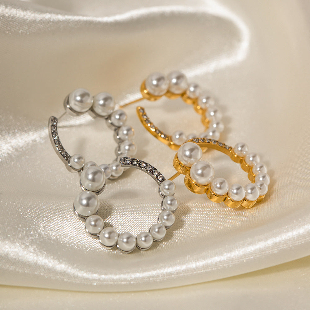 C-shaped earrings with full diamonds and pearls