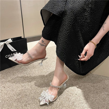 Stiletto slippers with high heels
