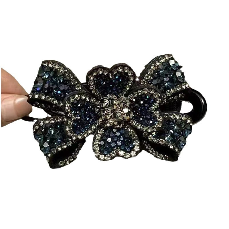 Horquilla con forma de pico de pato y mariposa tridimensional con diamantes de imitación 