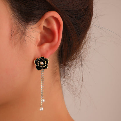 Diamond-encrusted black camellia earrings for women