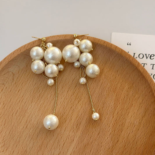 Cotton pearl fringed stud earrings