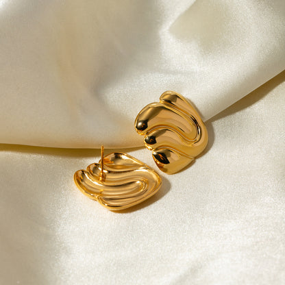 Concave and convex titanium steel earrings