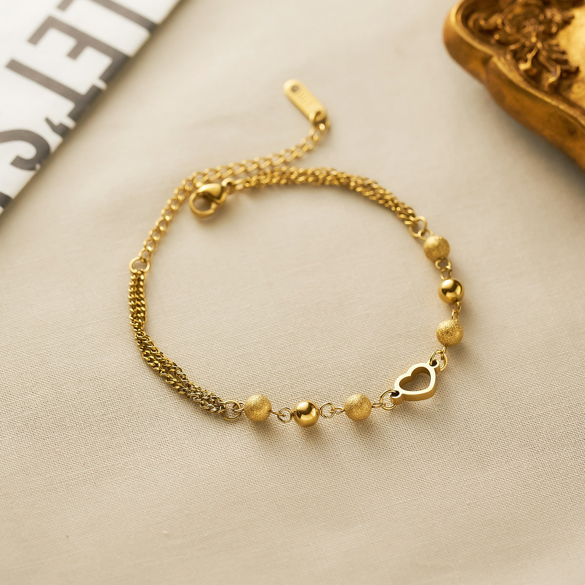 Women's Hollow Love Titanium Steel Bracelet — 18K Gold-Plated Matte Bead