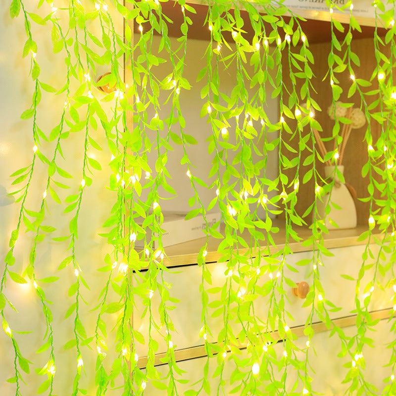 La lámpara del alambre de cobre de la hoja verde de la rota llevó la luz solar al aire libre de la planta 