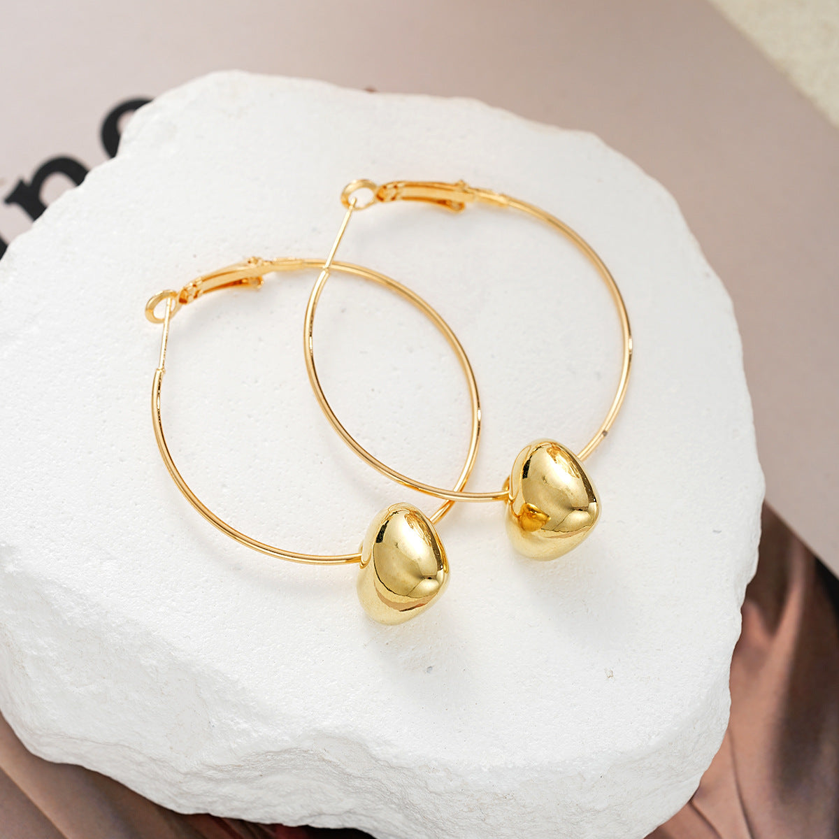Gold Hollow Heart Hoop Earrings