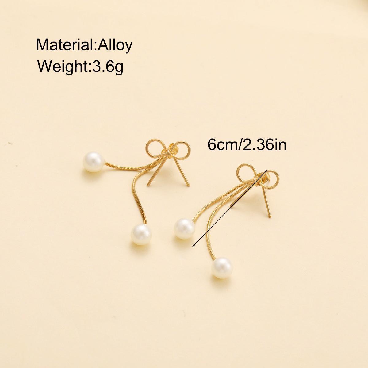 Bow Pearl Tassel Earrings