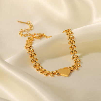 Pulsera de acero de titanio con corazón de amor y conchas marinas 