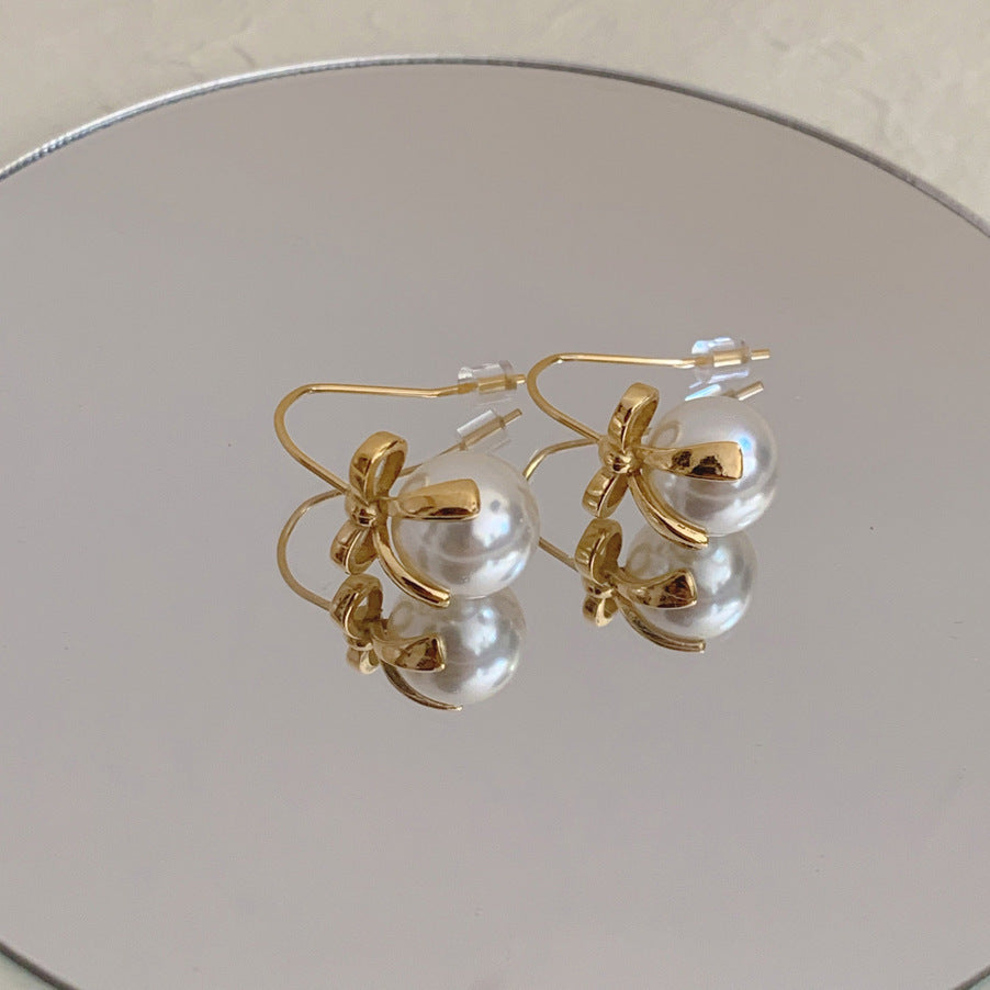 Pearl bow ribbon earrings