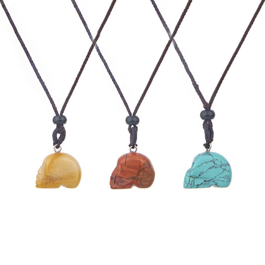 Pingente de aventurina verde com caveira esculpida em cristal olho de tigre 