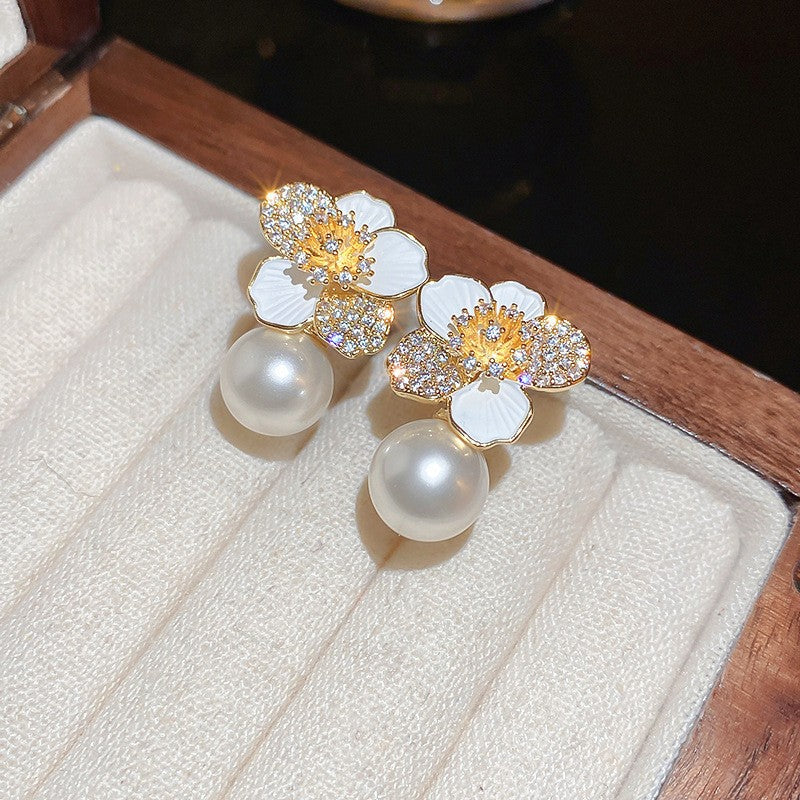 Dripping zircon pearl flower stud earrings