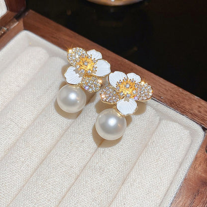 Dripping zircon pearl flower stud earrings