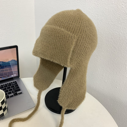 Acogedor gorro con orejeras de mohair para invierno 