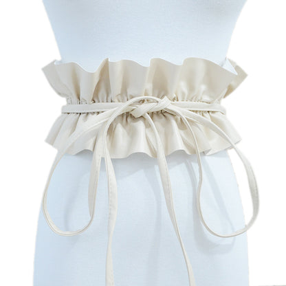 Elastic pleated edge belt