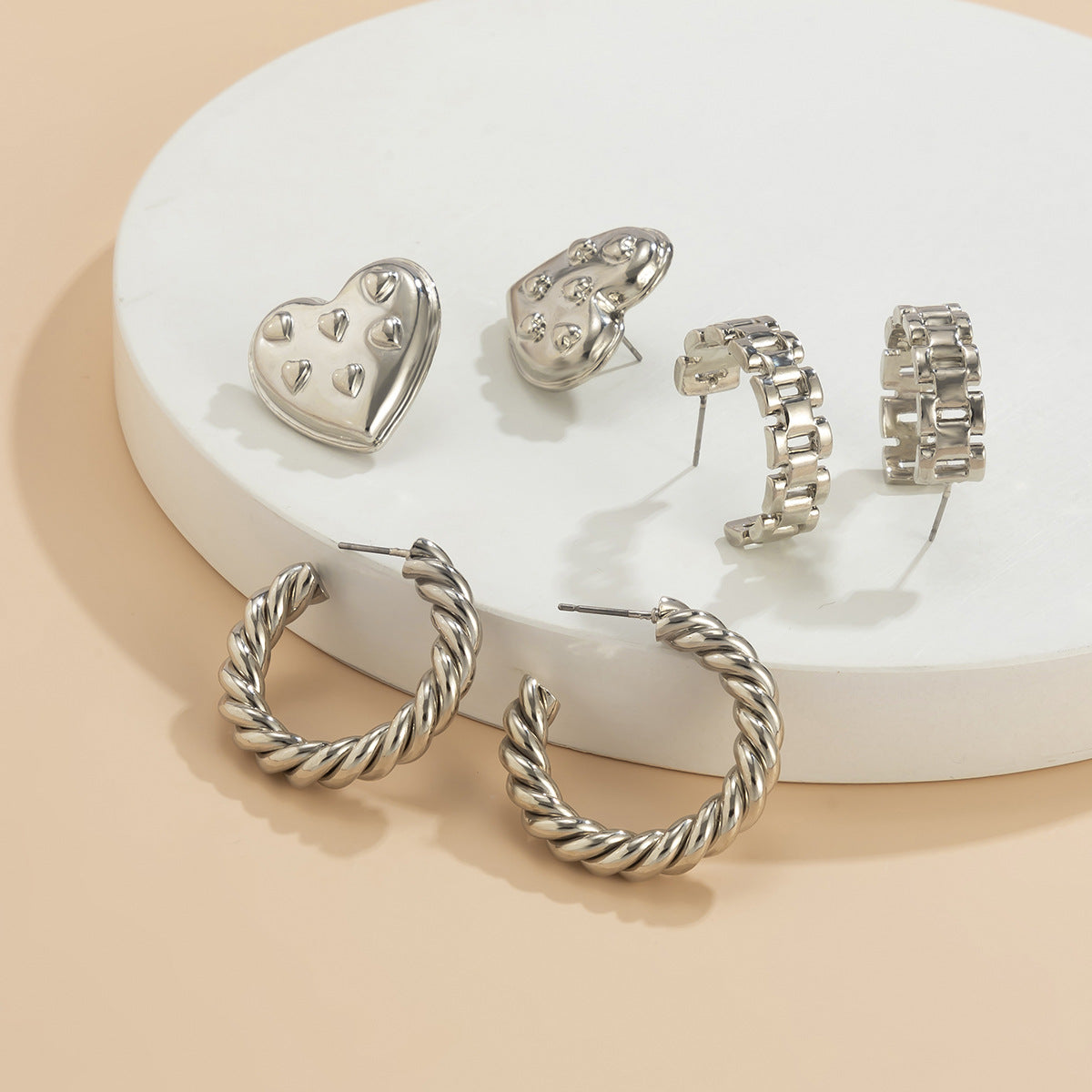 Pendientes vintage con forma de botón 