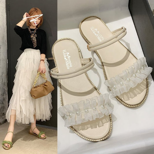 Two pearl slippers