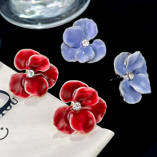 Pendientes tridimensionales de phalaenopsis con pétalos que gotean aceite en primavera y otoño 