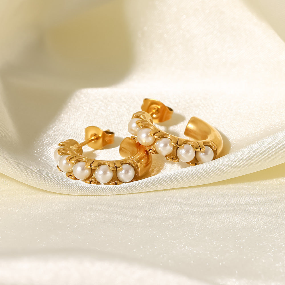 Pearl inlaid C-shaped earrings