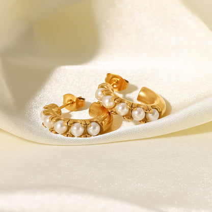 Pearl inlaid C-shaped earrings