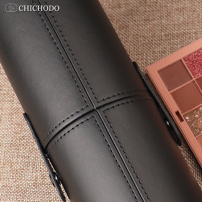 Soporte portátil para brochas de maquillaje. 