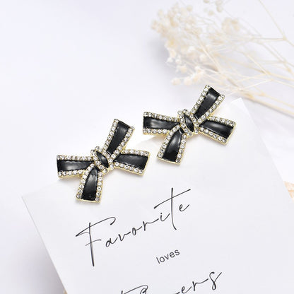 Pendientes con flecos de perlas y lazo de aguja de plata S925