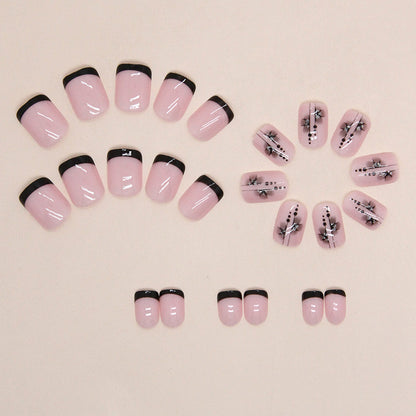 Uñas postizas cortas con pétalos franceses 