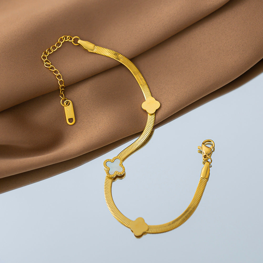 Four-leaf clover blade titanium steel bracelet