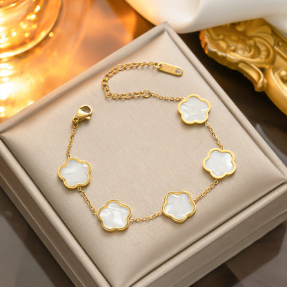 Pulsera de nácar de oro y acero titanio - De moda