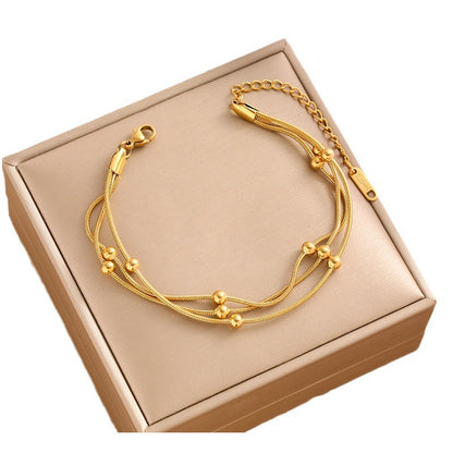 18K gold double-layer small round bead transfer bead bracelet