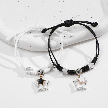 Par de pulseras extraíbles trenzadas en blanco y negro 